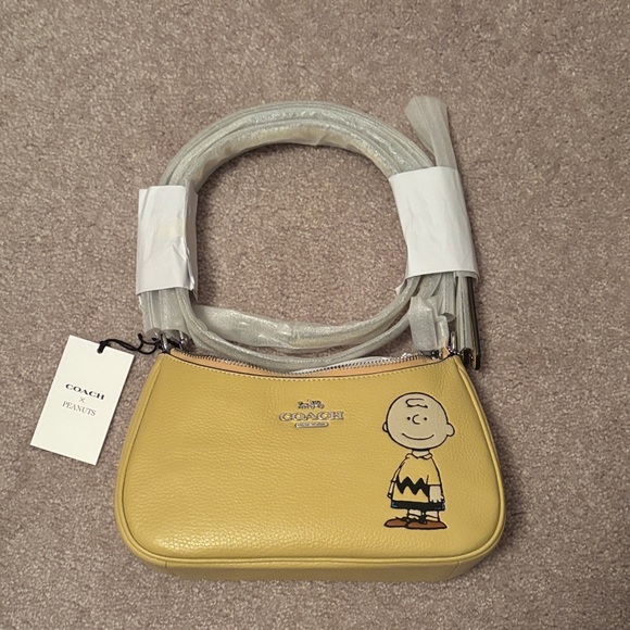 Coach Handbags - Coach Yellow Peanuts Crossbody Bag NWT
